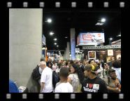 This is still from Mike and Laura's table looking down towards the movies, video games, etc. area. The Image booth in general was on what I call the line of demarcation. Half the show floor was comics, the other half everything else. Brilliantly, this meant for Image that there was lots of foot traffic going by their booth.
