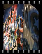 The banners for the Alex Ross Art booth right next to Bongo Comics.